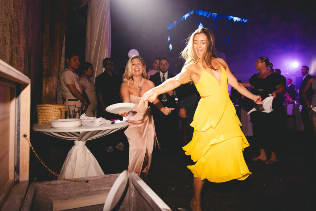 people throwing plates - a traditional Greek celebratory ritual