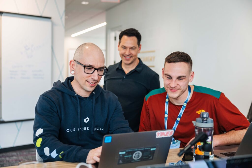 Business Technology employees working