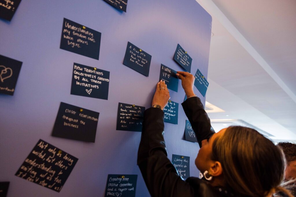 employee interacting installation at event